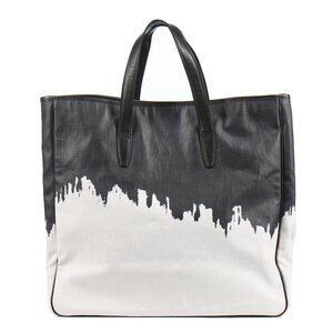An Yves Saint Laurent canvas and painted tote bag